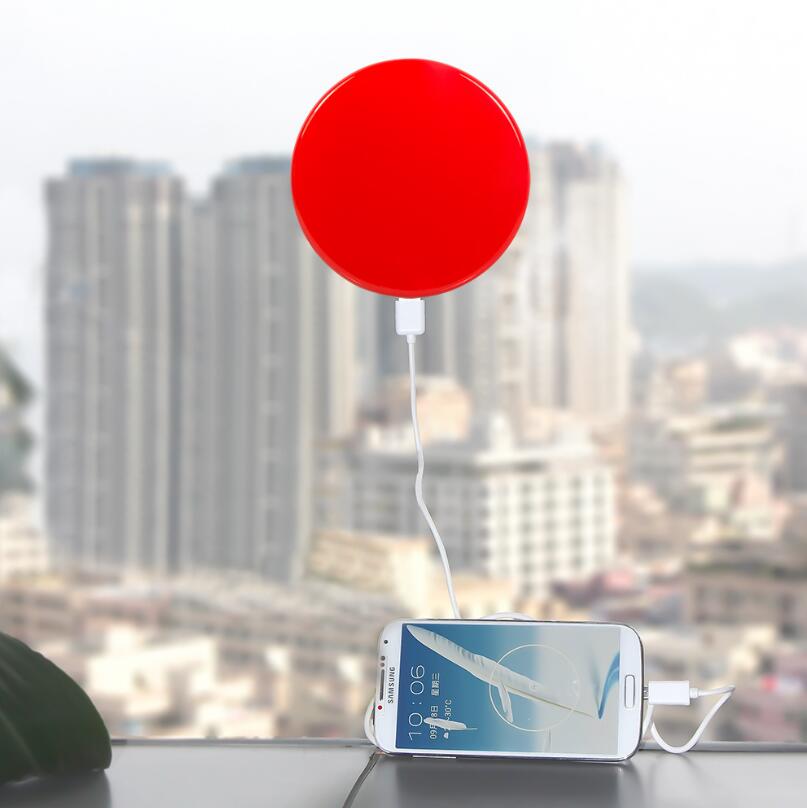 Solar-Powered Mobile Charger with Suction Cup Mount